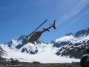 Chopper over glacier