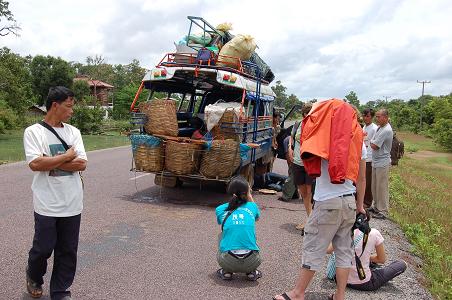 Changing the tyre. The truck really is that small, and is not a long way away