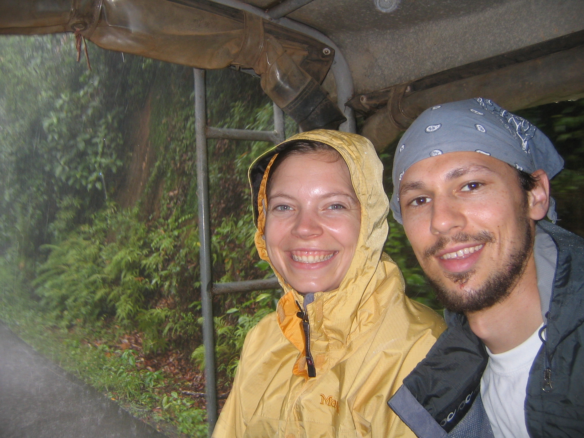 Dodging the Rain in the Back of a Pickup Truck/Taxi