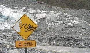 Danger of bludgeoning by falling ice before slipping into a wild current and getting pinned against rocks