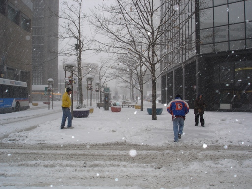 People downtown struggle through the blizzard