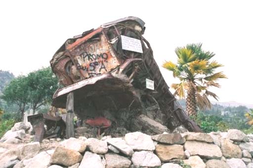 A mangled bus destroyed by the landslide