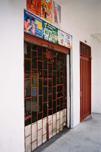 Shopping is often done behind locked bars, for the protection of the shopkeepers