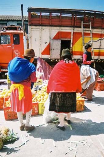 Local women dressed in very, very bright and colourful costumes