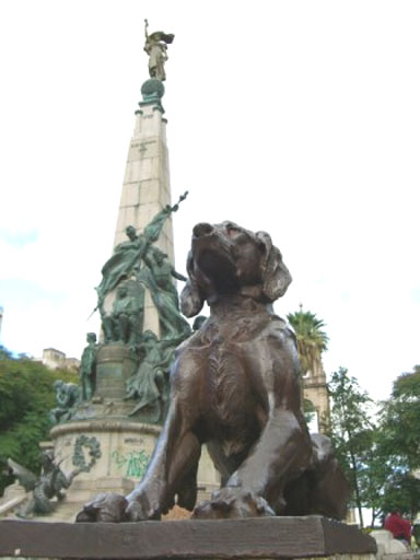 Dog statue at a plaza