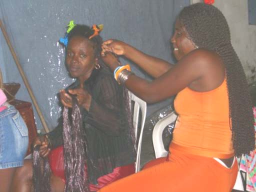 Betty, having her hair braided... for hours and hours